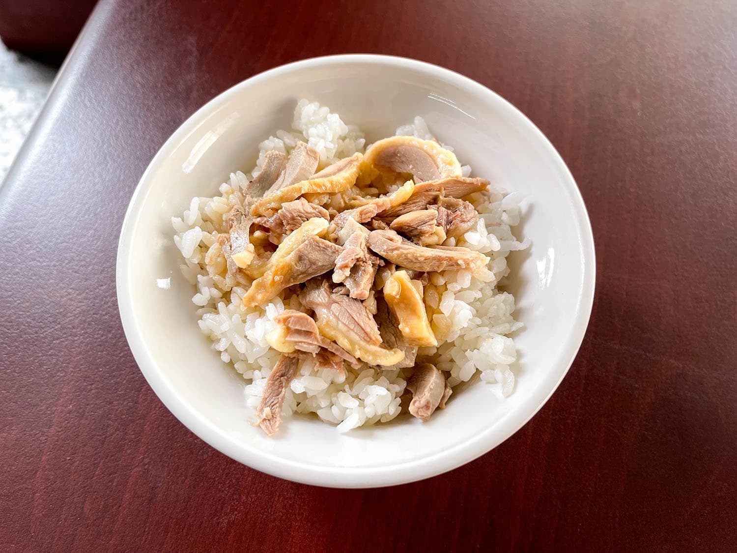飄散脂香的鴨肉飯,同樣不容錯過。(Michelin提供)