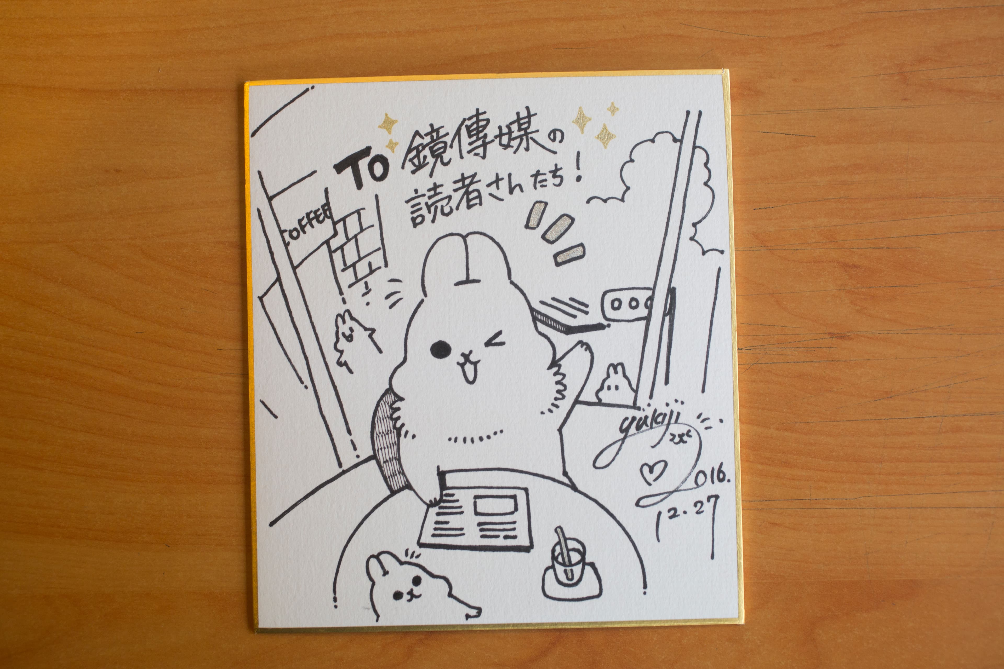 YUKIJI畫圖跟鏡傳媒讀者打招呼。