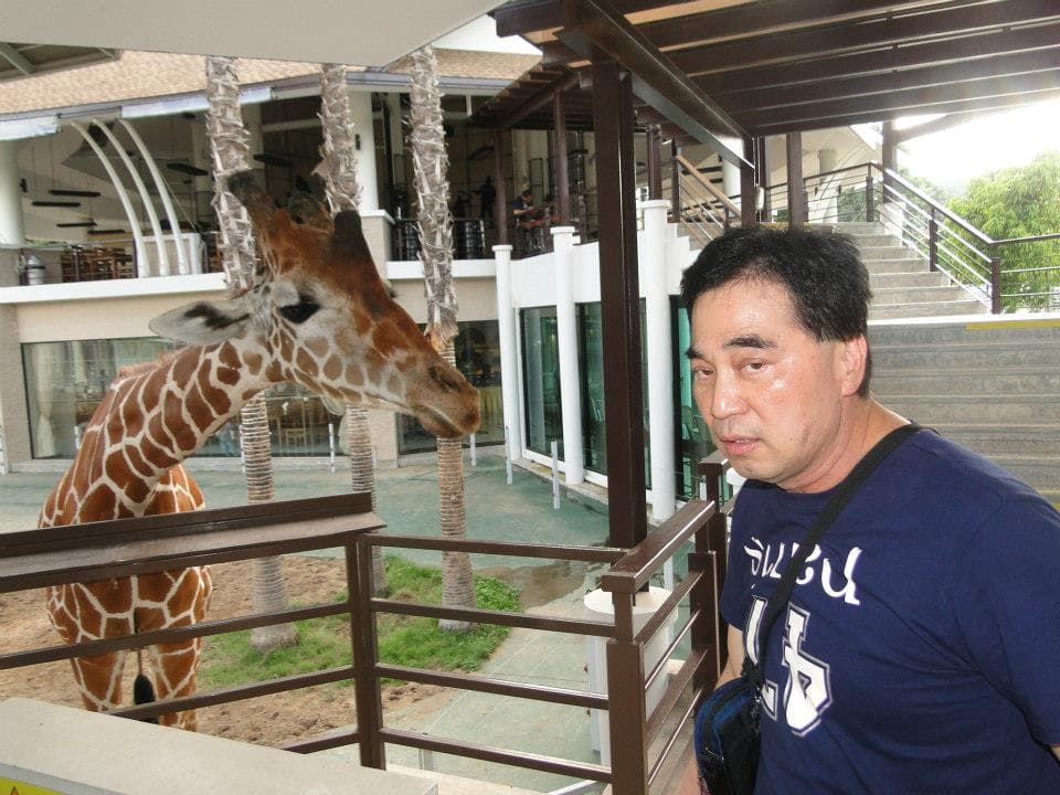 葬儀社老闆李銘根出遊照片。