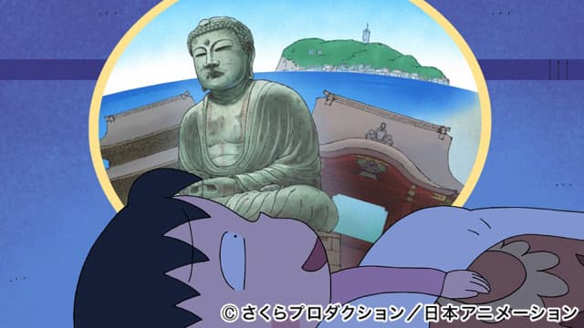 對照片地點非常在意的小丸子。