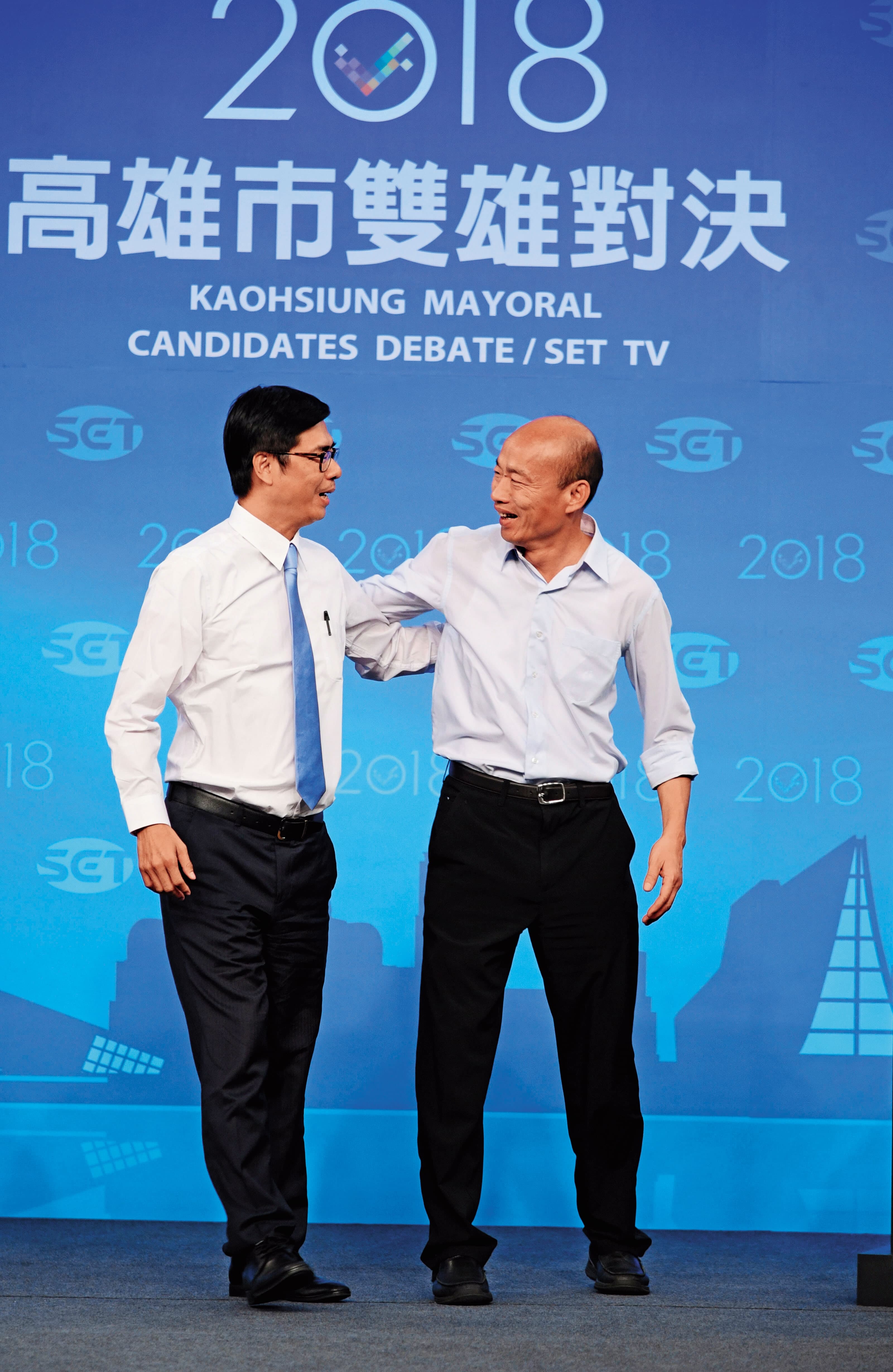 前對手陳其邁（左）如今成為行政院副院長，韓國瑜（右）與陳其邁互動備受關注。（三立提供）
