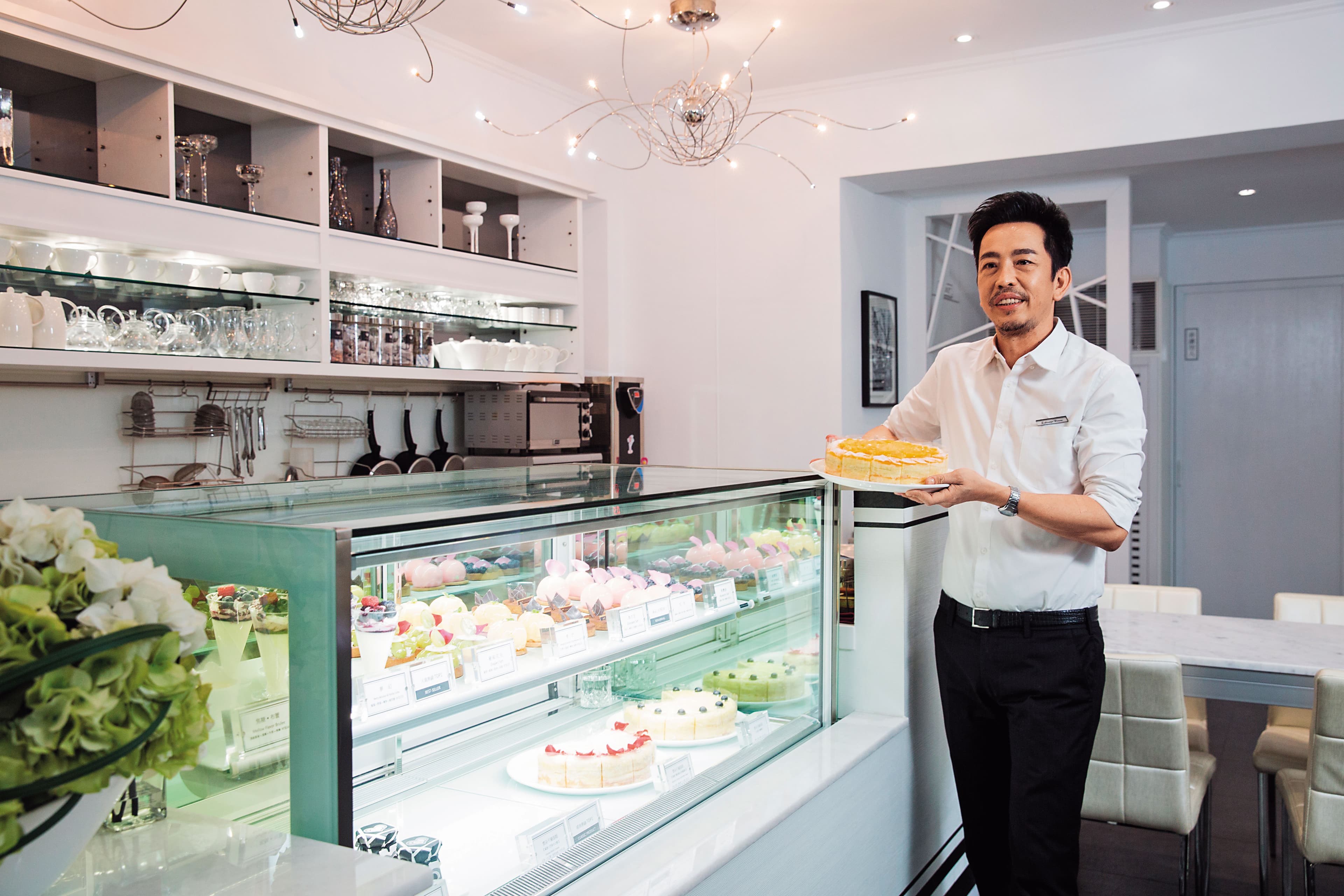 Rico喜愛簡約風格,店內裝潢、產品包裝都以黑、白色系為主。