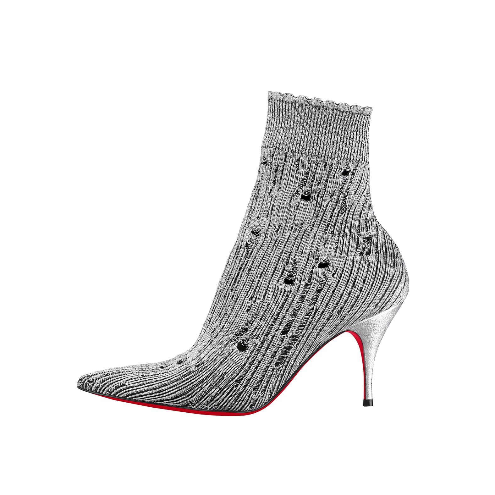 以白雪皚皚的喜瑪拉雅山為靈感的八公分高短靴。NT$37,600(Christian Louboutin提供)