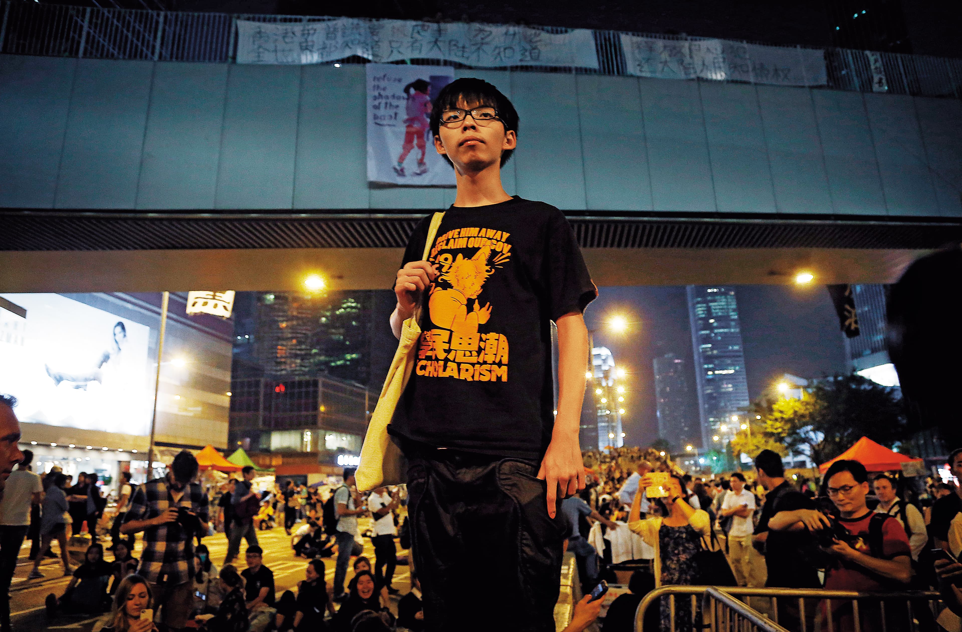 傘運那年，17歲的黃之鋒成為美國《時代雜誌》亞洲版封面人物，更被選為當年25名最具影響力的青少年。（達志影像）