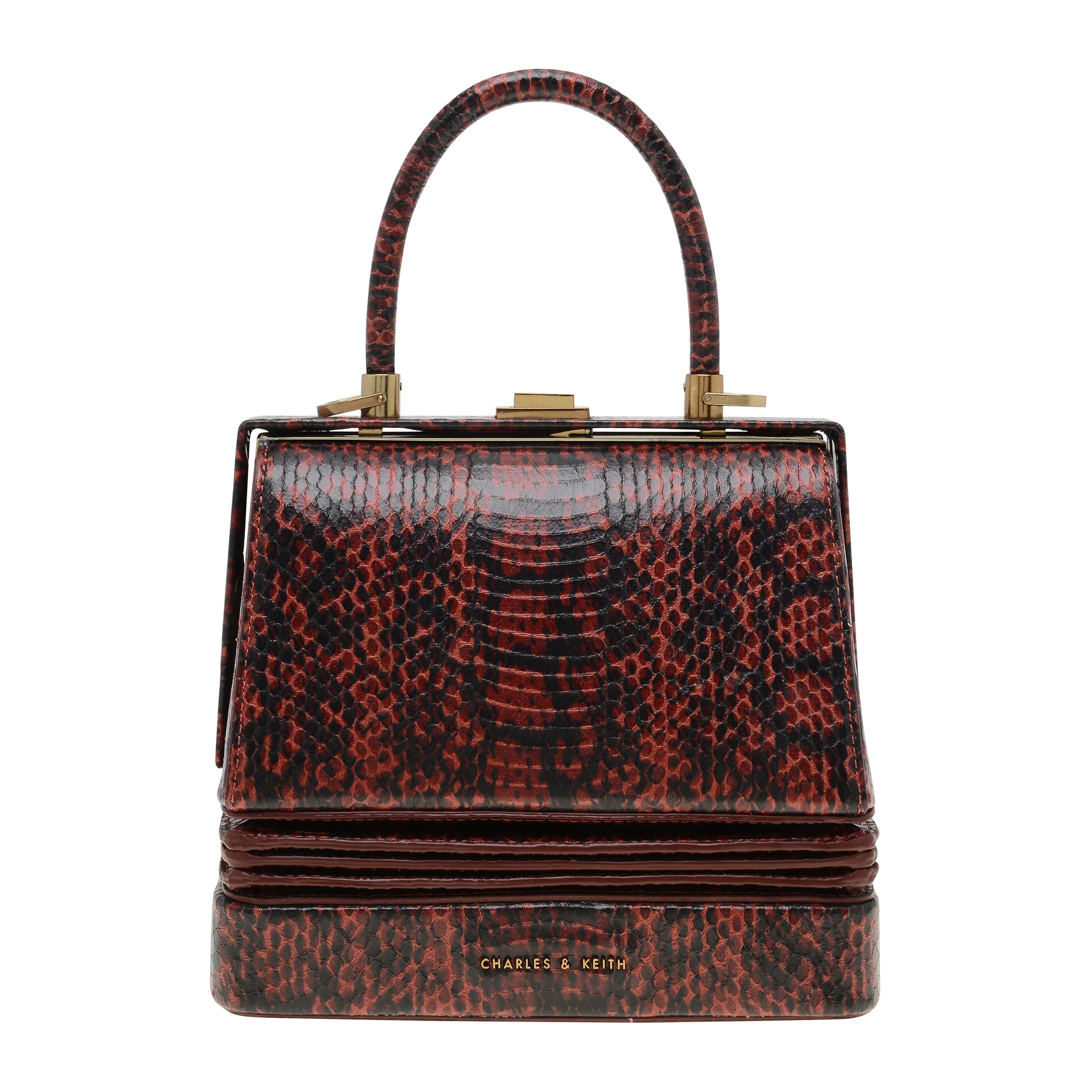 蛇紋方形手拿包，NT$3,590。（CHARLES & KEITH提供）