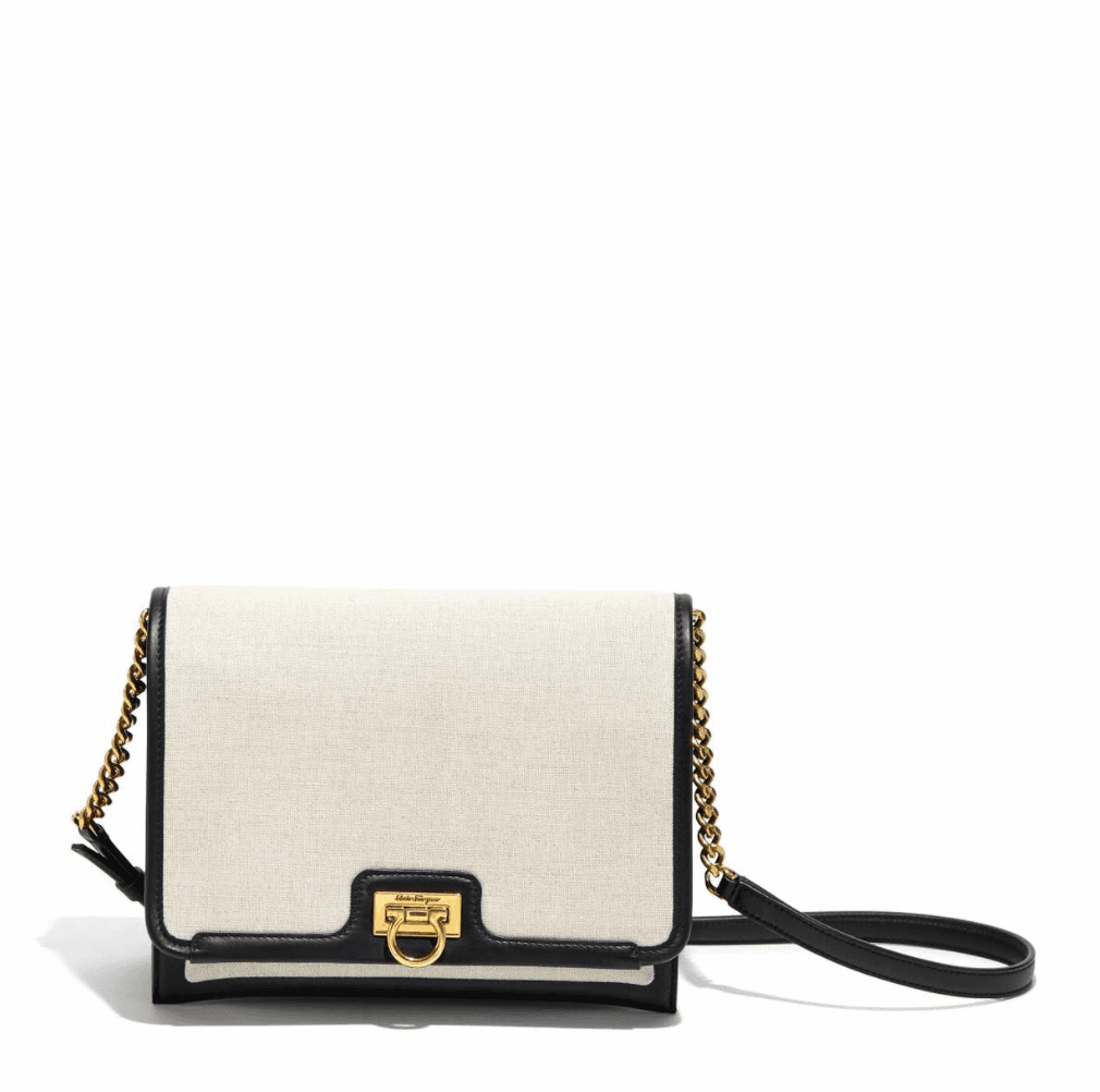 TRIFOLIO黑白布面拼接翻蓋肩背包。NT$69,900(Salvatore Ferragamo提供)