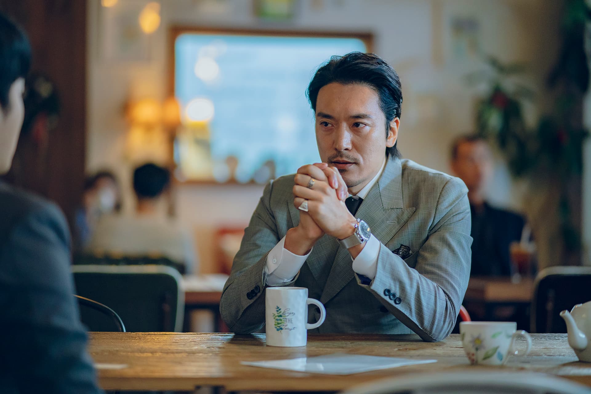 金敏俊在《我們,愛過嗎?》飾演電影投資公司代表九把刀。(Netflix提供)