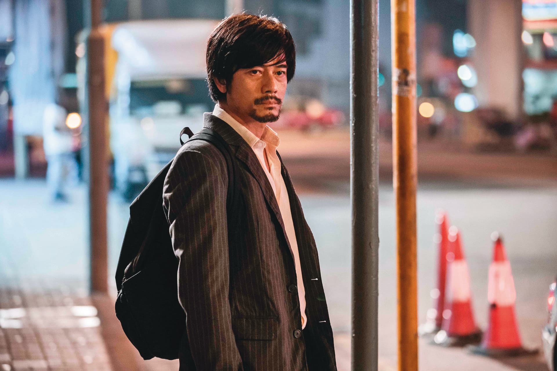 郭富城在港片《麥路人》演出中年男子愧對家人的痛苦,電影裡遊民的谷底殘酷人生,令人不忍。