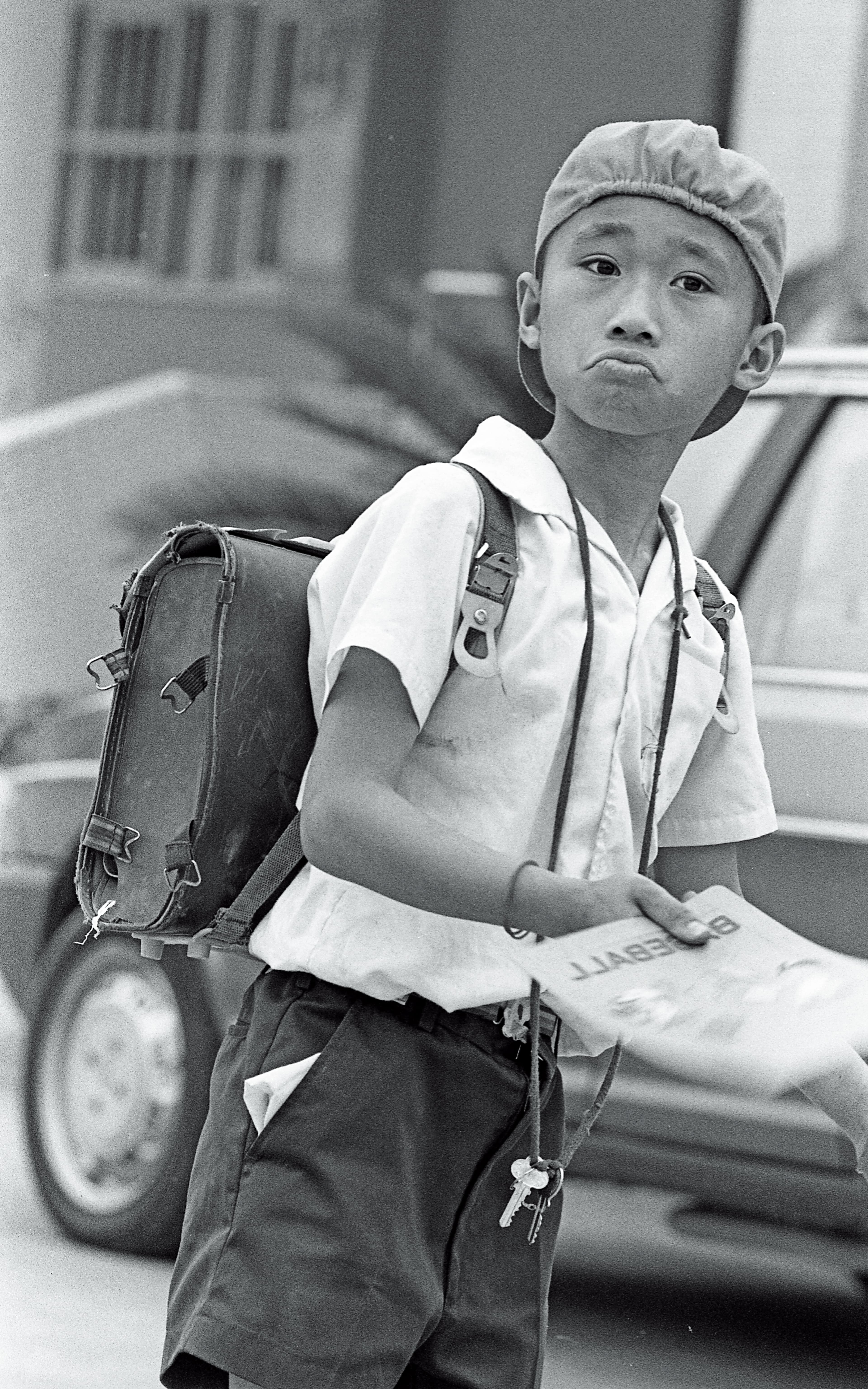 1988年,10歲的周子飛已進入小學就讀,尚無法說出一句完整的話。(蔡明德攝)
