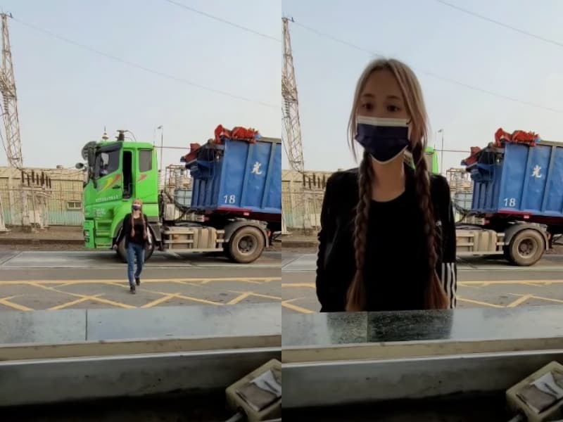 女司機從卡車駕駛座步下,嬌小身形與身後大車形成強烈對比。(翻攝自爆廢1公社)