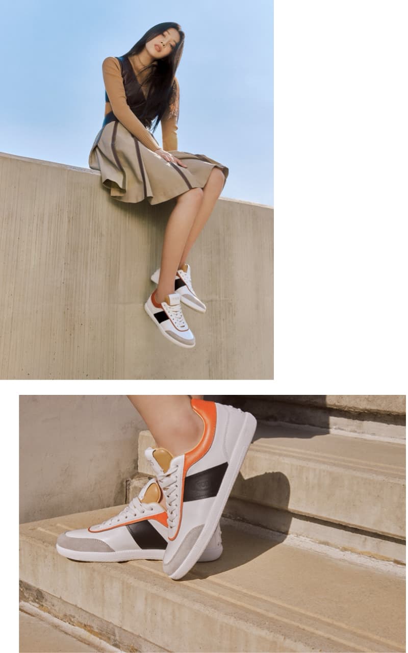 Joy腳穿TOD'S復古皮革拼接休閒鞋,NT$23,000。(迪生提供)