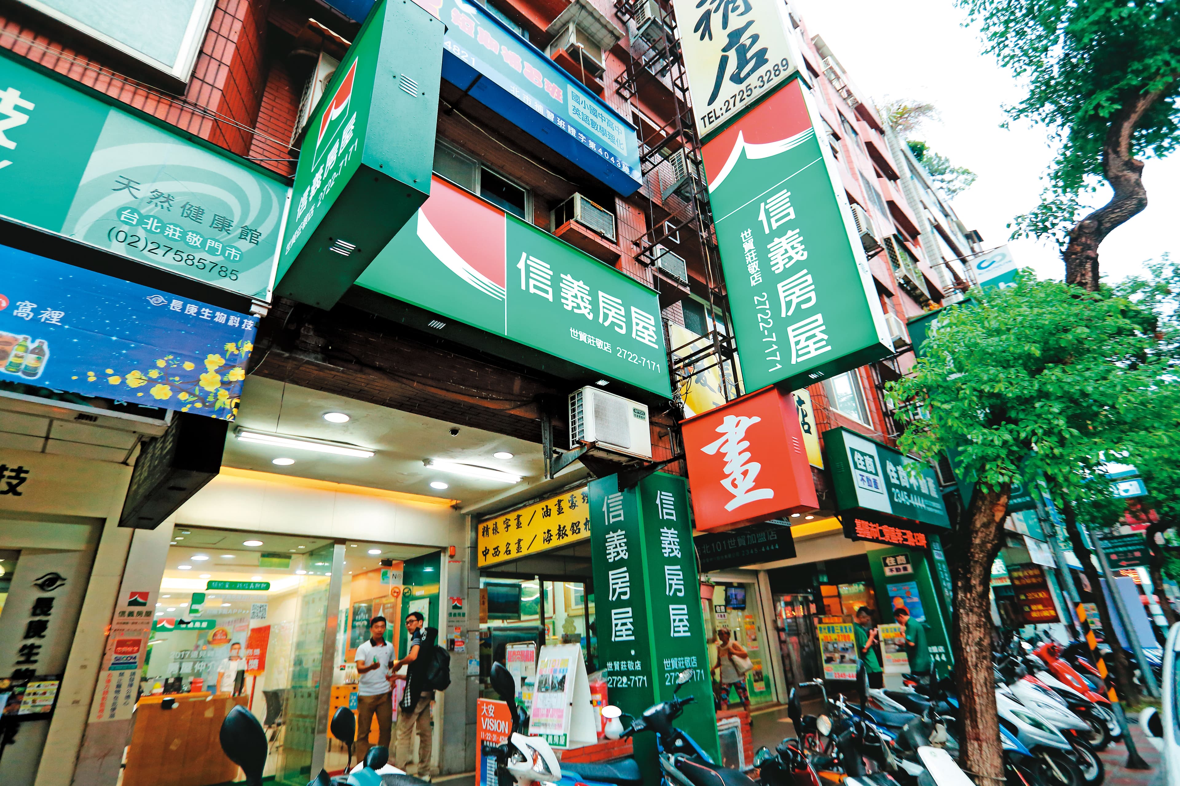 成立40年的信義房屋,周俊吉提出「2030年淨零排放,集團2050零碳排」的超前目標。