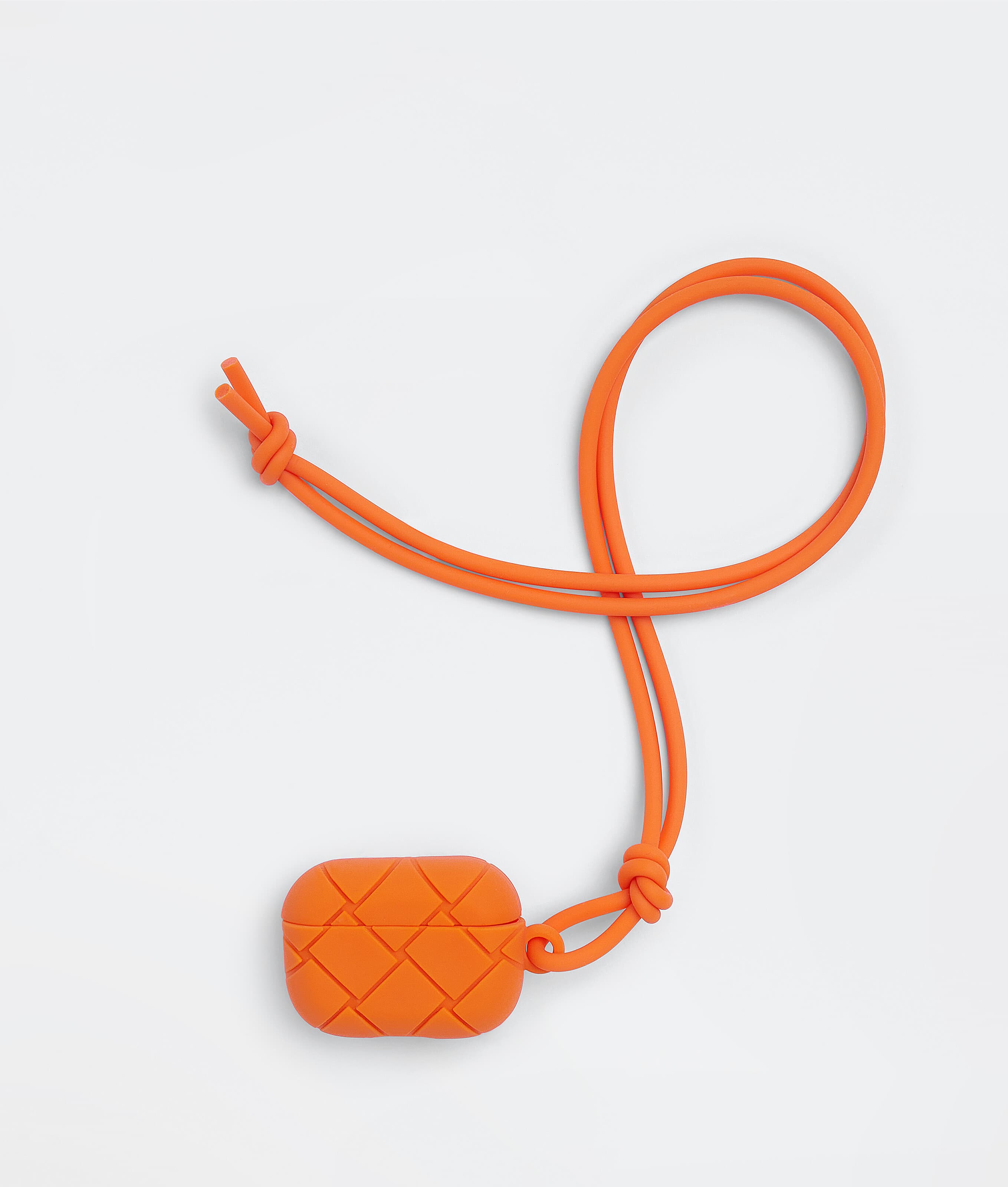橡膠Airpods Case(鮮橙橘)。NT$5,100(BOTTEGA VENETA提供)