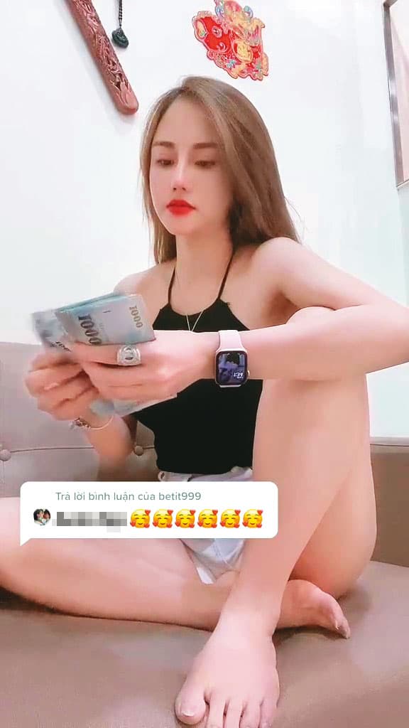 外型亮麗的密醫陳女刻意在鏡頭前數鈔票,打造美麗多金的形象。(讀者提供)