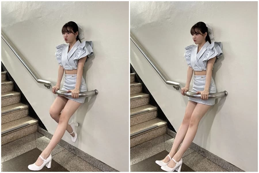 勝熙鑽進樓梯的扶手空隙做出俏皮的姿勢。(翻攝自hyun_maxiang IG)