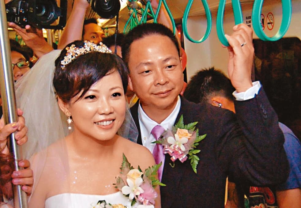 台北市勞動局長陳信瑜(左)與丈夫張師齊(右)2008年結婚,夫妻倆爭議不斷。(中央社)