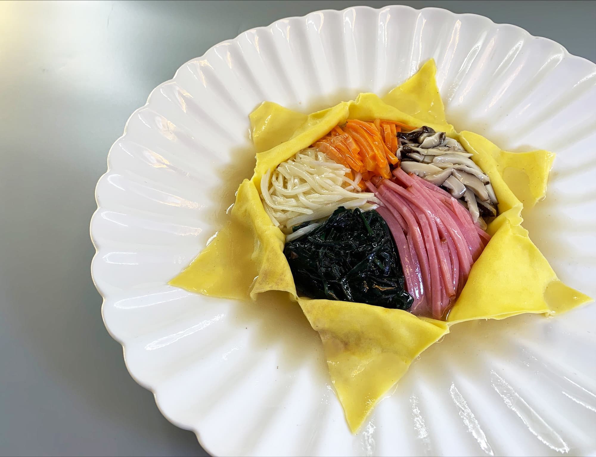 「干貝絲菊花菜」重現老菜風華。(吳健豪提供)