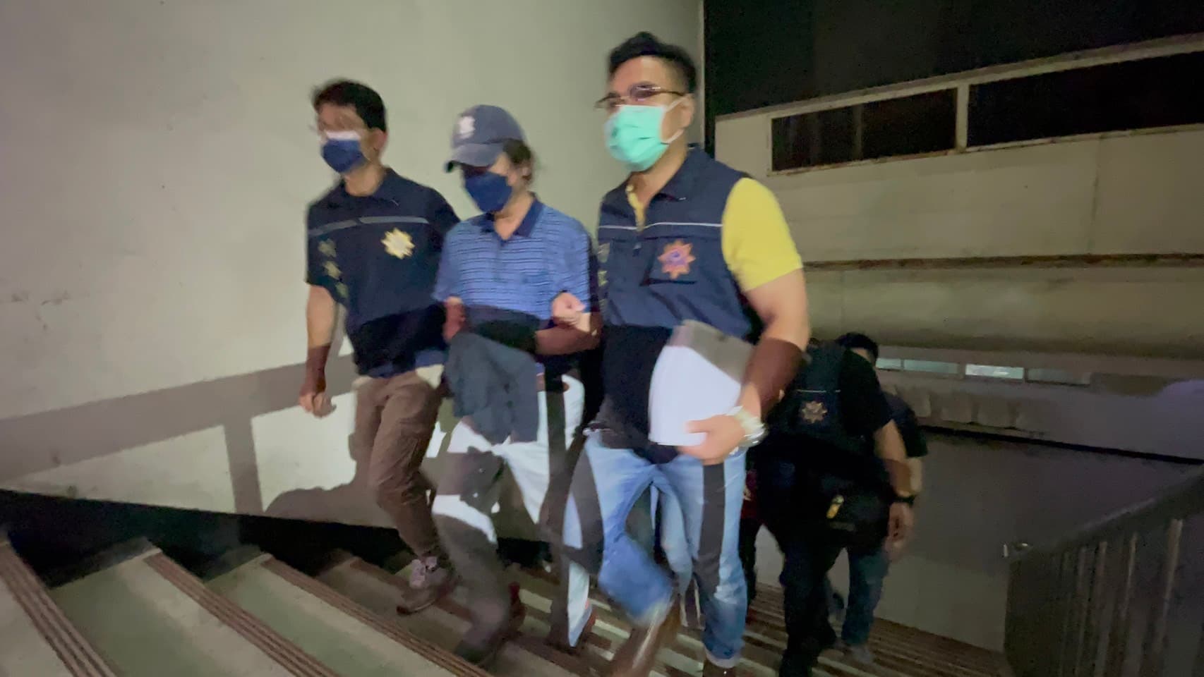 前行政院政務顧問陳振坤涉im.B吸金案,今拘提其到案。