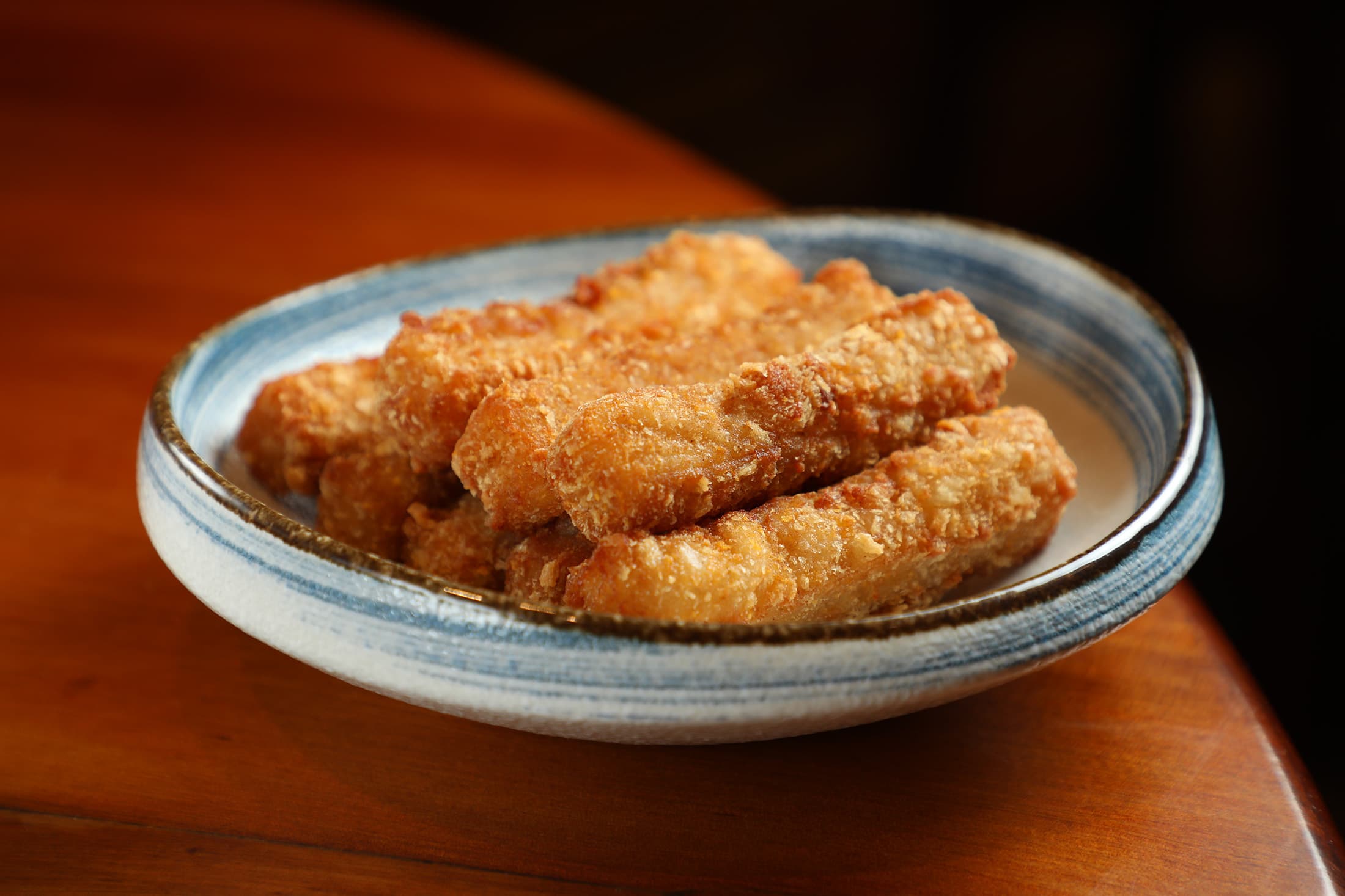 「聰明魚薯條」是沙鍋菜常見的邪惡配菜。(林聰明獨享魚薯條鍋658元╱份)