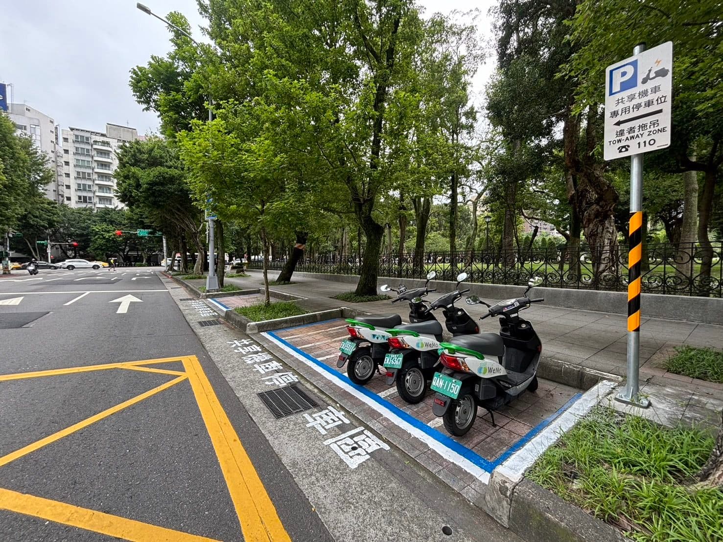 北市與松山區富錦里、信義區興隆里合作試辦共享機車專用區。(台北市交通局提供)