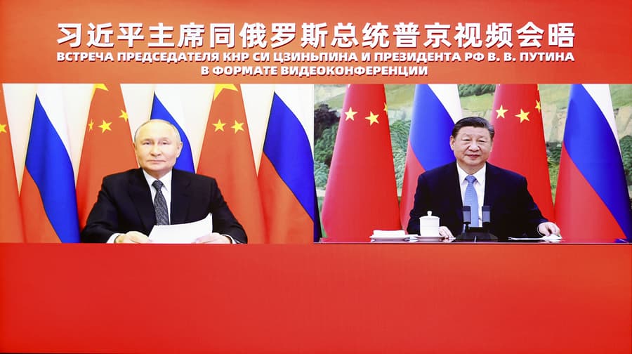中國國家主席習近平與俄羅斯總統普丁就隨即透過視訊談話。(翻攝自新華社)