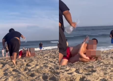 一名少年看不慣情侶公然在海灘親熱,上前直接從他們上方倒了一瓶水。(翻攝每日郵報)