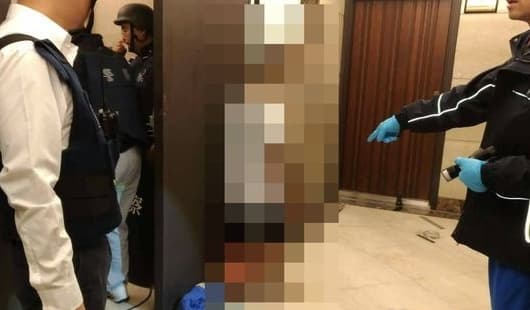 歹徒自知無路可逃,在大樓樓梯間上吊身亡。(翻攝畫面)