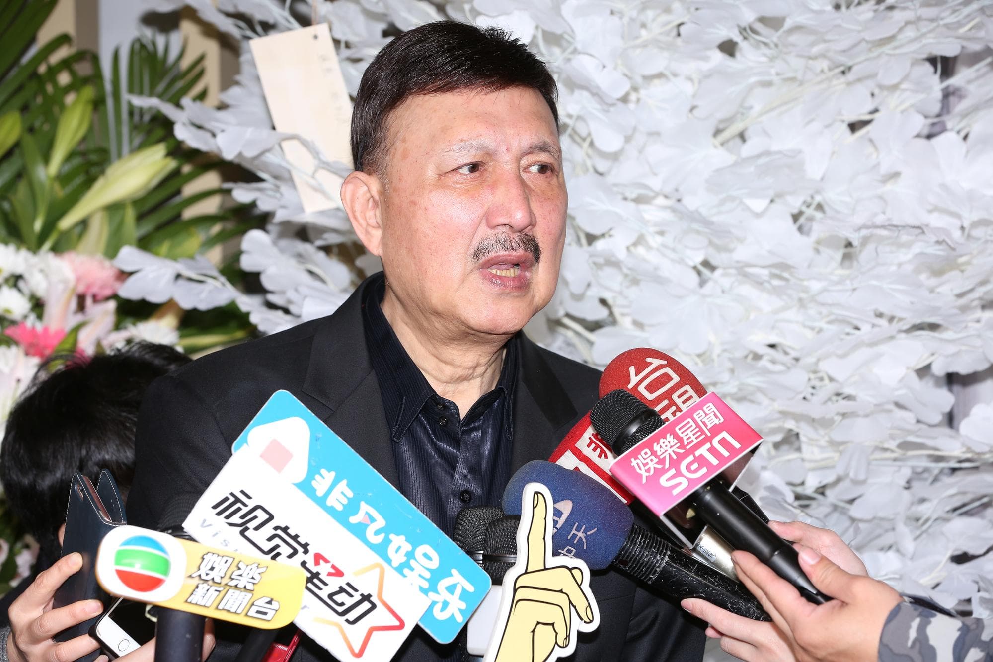 余天的四弟因走私海洛因被中國公安槍決,讓余天非常傷心。(資料圖片)