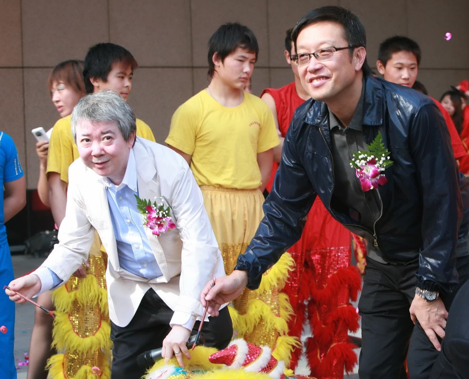 文雋和導演劉偉強(右)合作的《古惑仔》系列和《風雲之雄霸天下》等片都曾引領風騷。(東方IC)