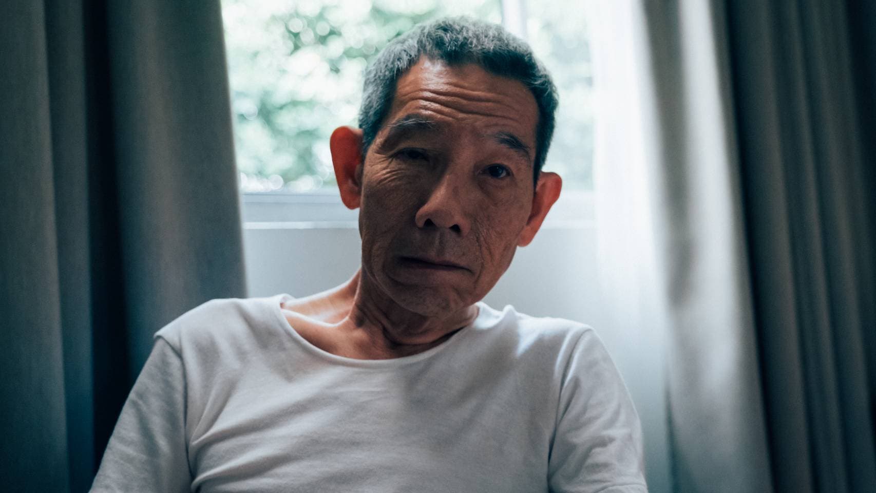 楊世彬自謙只是業餘演員,但他揣摩中風病人的神態相似到很多人以為他是真的中風。(金馬執委會)