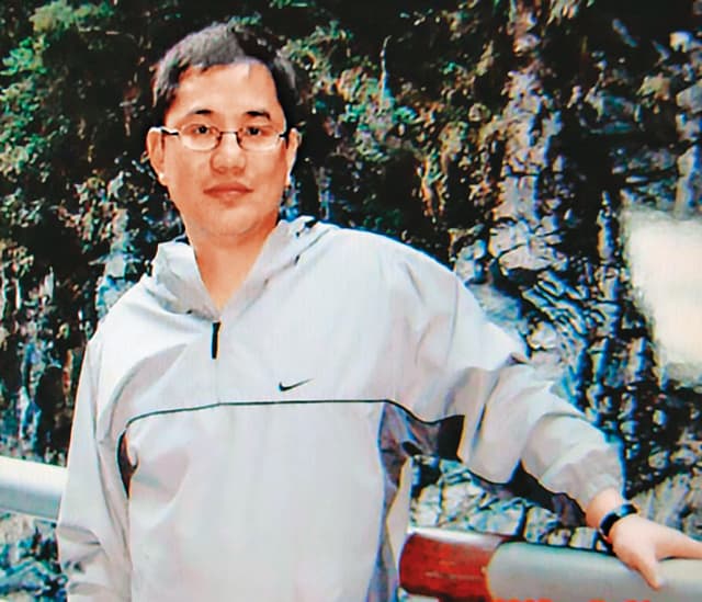 集團首腦林明樺準備偷渡出境時被捕,之後趁機服毒自盡。(翻攝畫面)