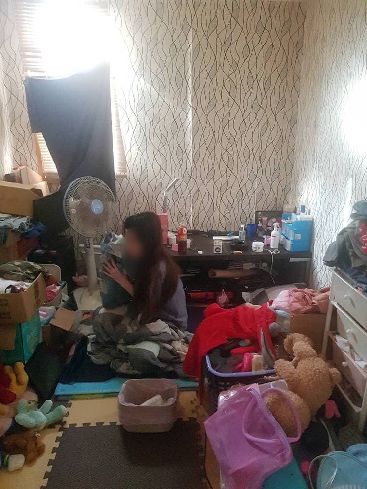 綽號「大姊」的傅姓女子,在基隆住處遭逮。(翻攝畫面)