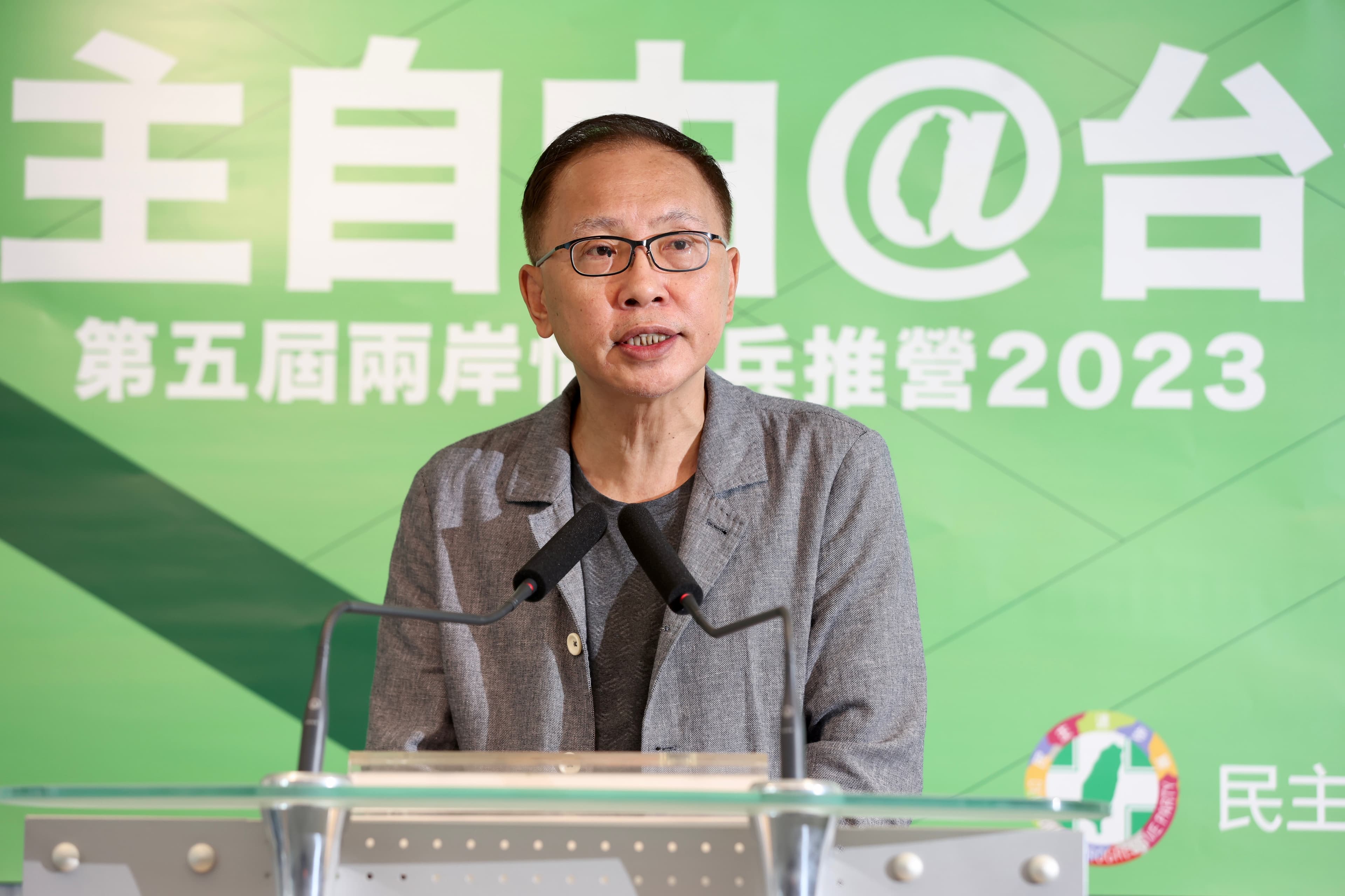 中央警察大學教授、民進黨中國部前主任董立文出席記者會。(民進黨提供)