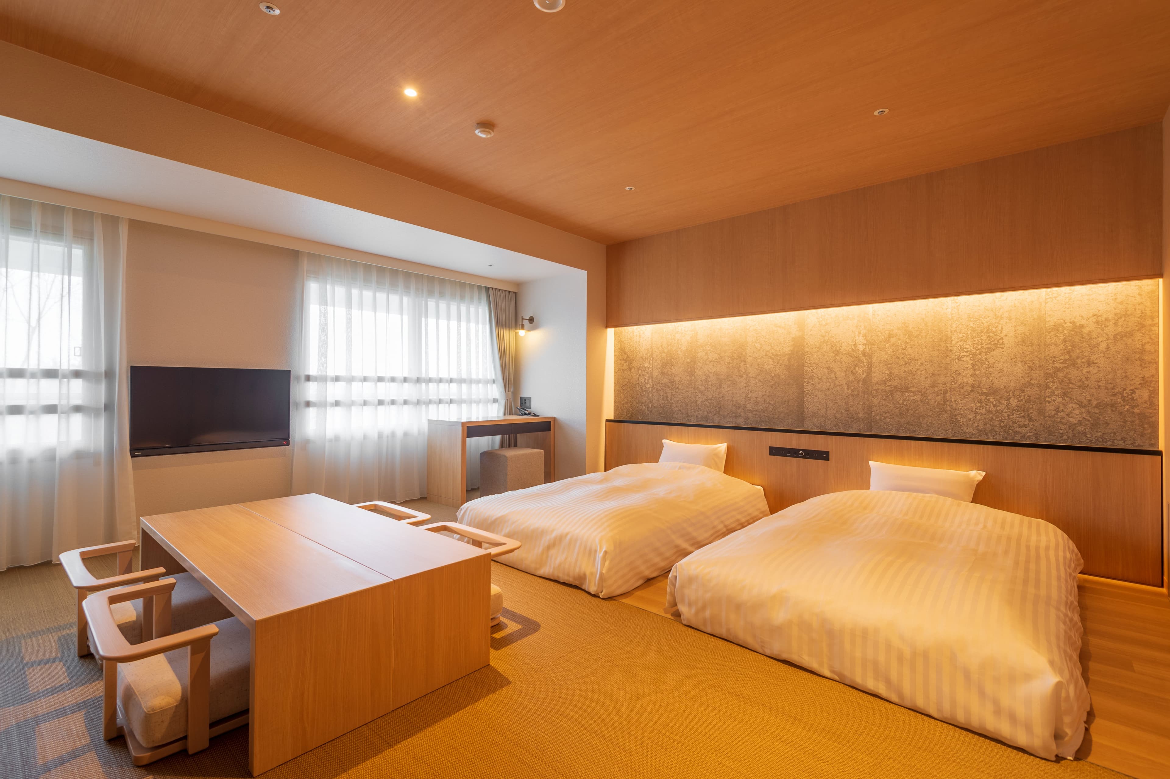 妙高市「Lime Resort Myoko」正對日本百座名山和北信五岳,旅人可將海拔2,500公尺的高山雪景盡收眼底。(Booking.com提供)